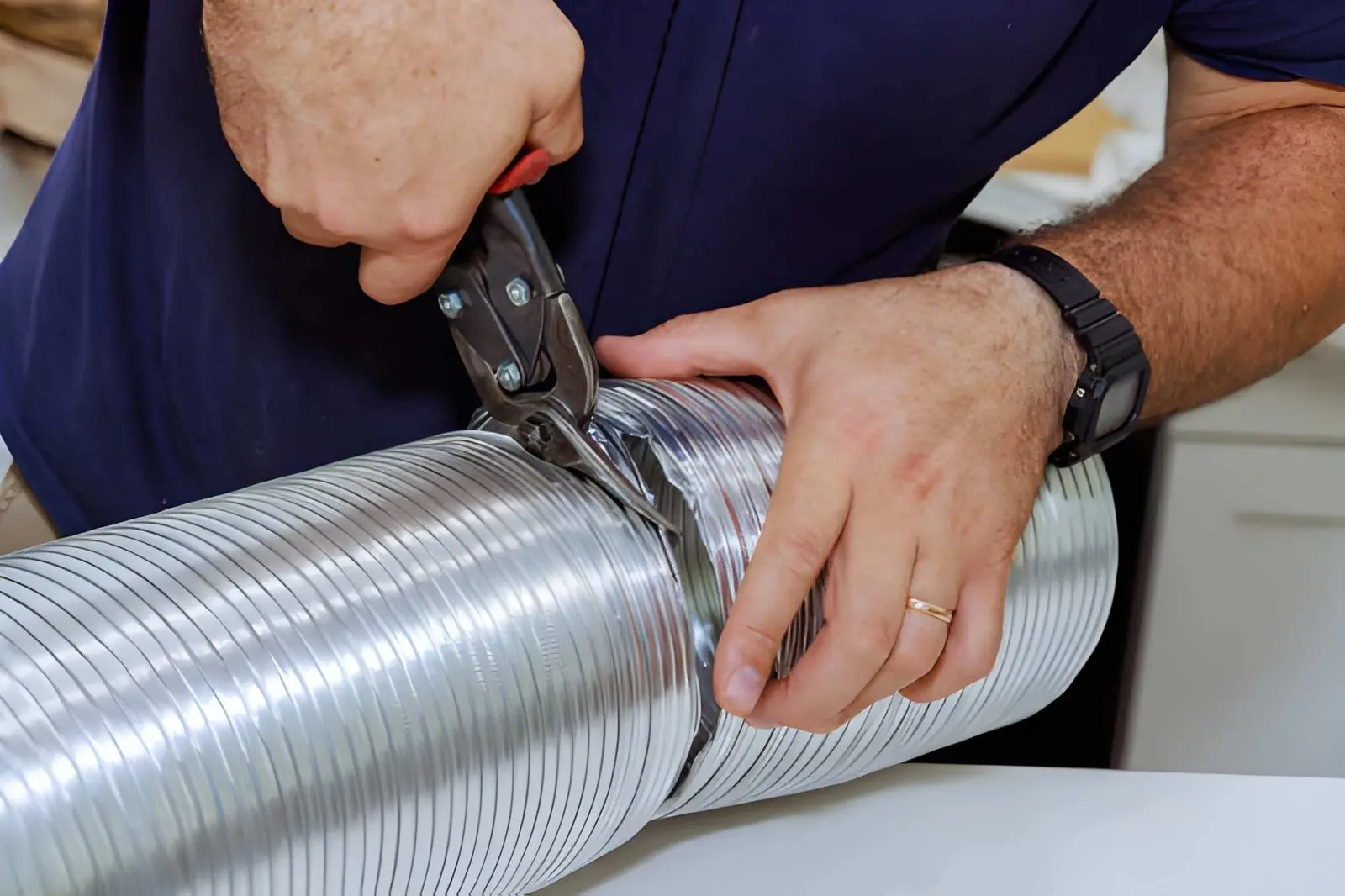 Certified technicians performing expert dryer vent installation for reliable airflow